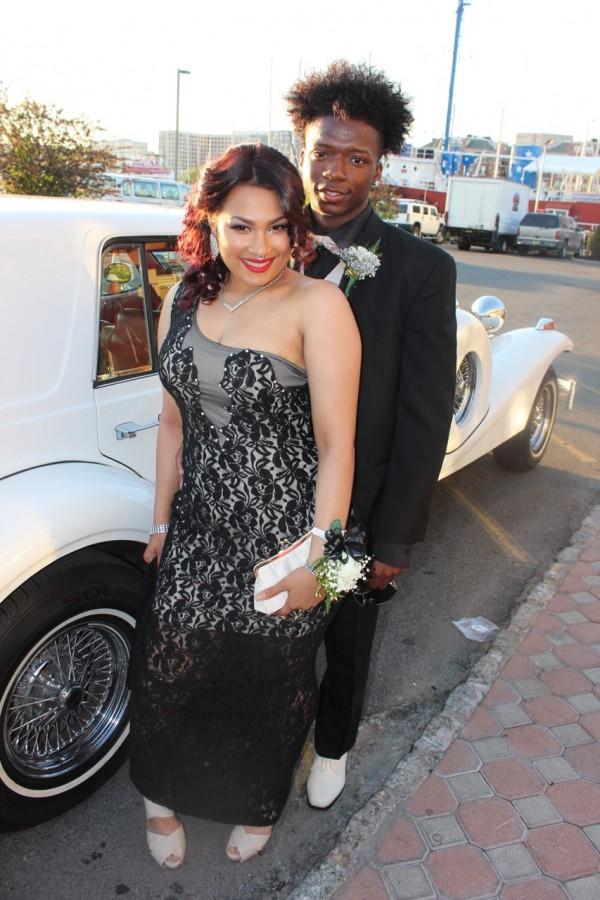 Seniors Lucilla Terrero and Kwesi Owusu pose in front of their vintage limo. The 2015 senior prom was held at Liberty House in Jersey City May 14. Photo by Mahkiya Gresham