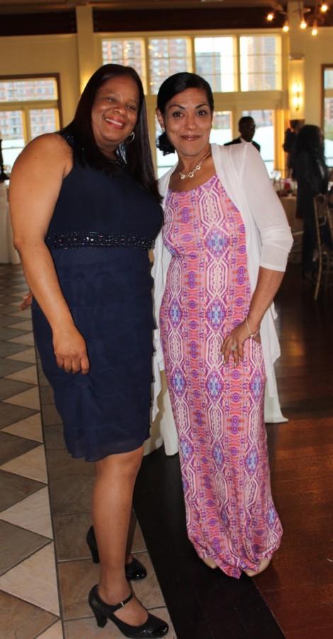 Teacher Erika Nimbley-Sealey and front desk coordinator Daisy Rodriguez smile for the camera. The 2015 senior prom was held at Liberty House in Jersey City May 14. Photo by Mahkiya Gresham