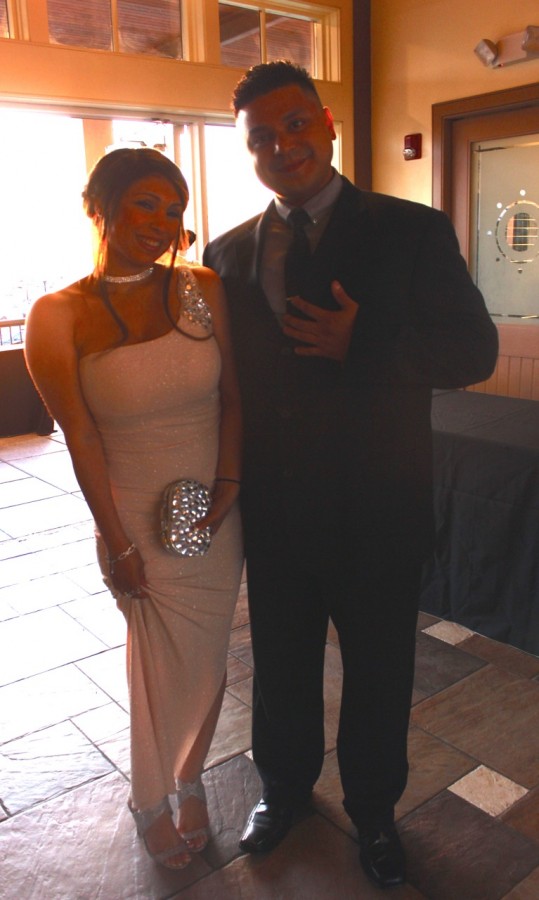 Senior English teacher Carlos Yepez and guest arrive at prom. The 2015 senior prom was held at Liberty House in Jersey City May 14. Photo by Mahkiya Gresham