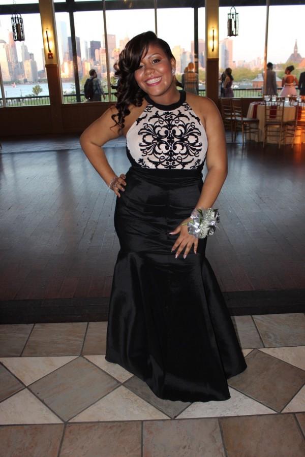 Senior Kayla Garcia poses in front of the dance floor. The 2015 senior prom was held at Liberty House in Jersey City May 14. Photo by Mahkiya Gresham