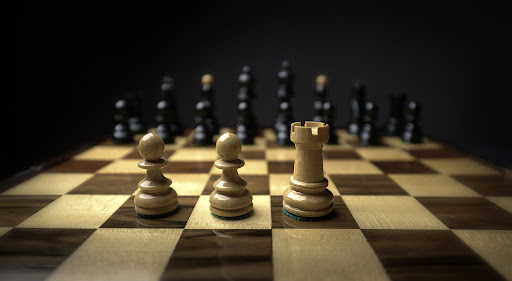 Chess pieces on top of chess board.
Photo Credit: Flickr