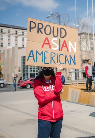 Caption:
An Asian American let’s everyone know they are proud of who they are. 
Source: Unsplash