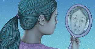 A girl looking into the mirror experiencing facial dysmorphia. 
